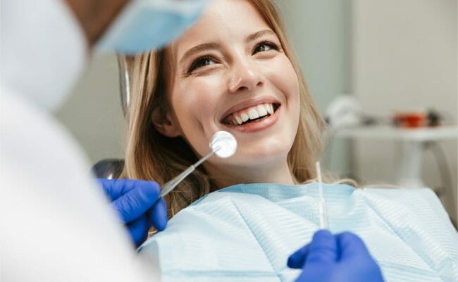 woman smiling at dentist
